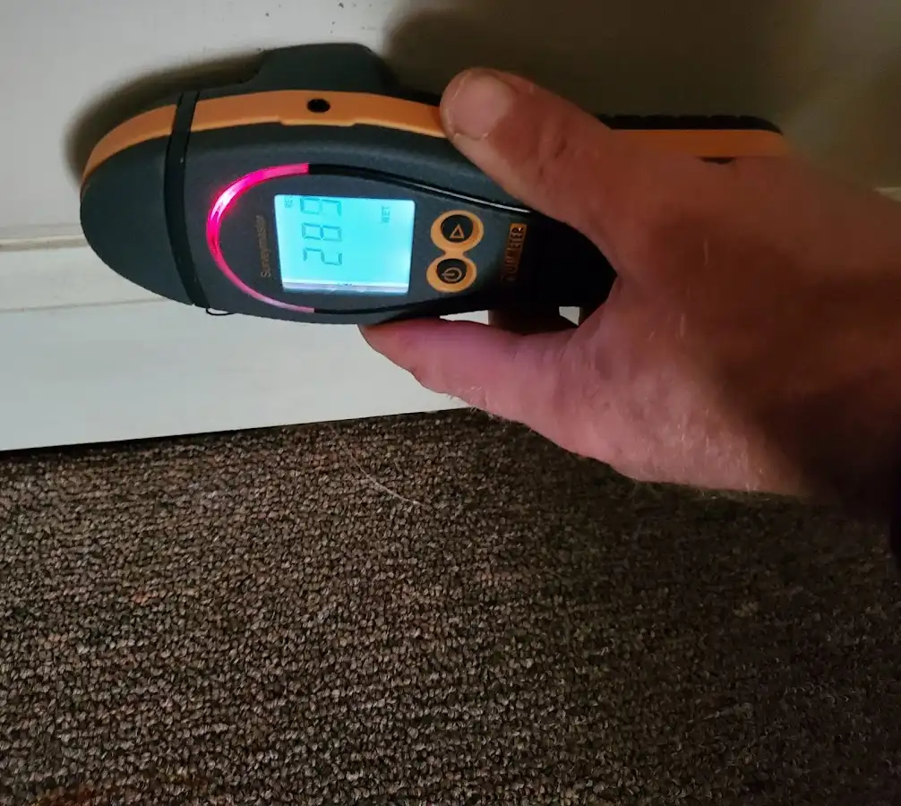 Moisture detection at baseboard during Burst Pipe Cleanup in Scottsdale